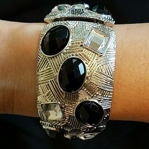 Silver bracelet with faux crystal and black gems
